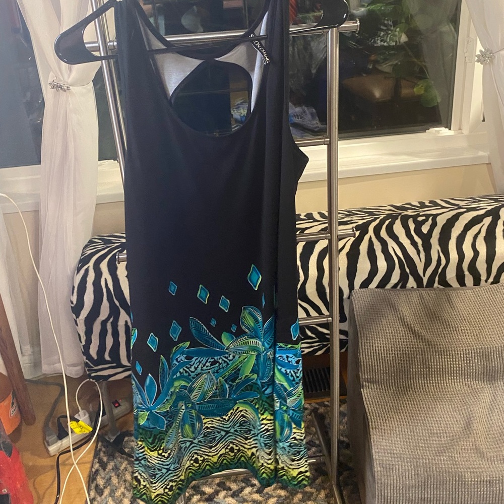 5.  Simon Chang Black Dress with Blue and Green Accents